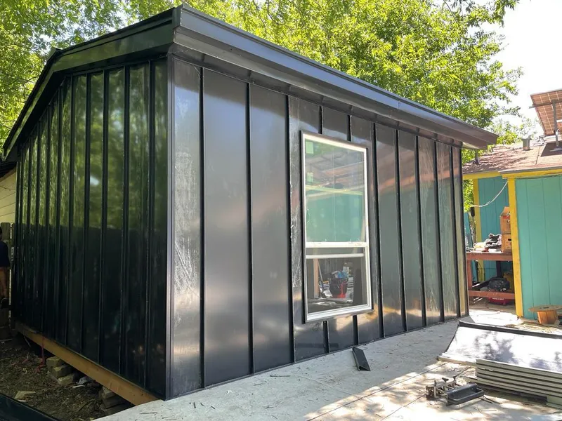 Black standing seam metal wall panels for Metal Roof Installation in Darby