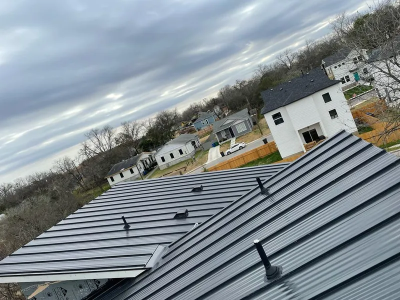 Standing seam metal roof panels with vents for Skylight Repair in Darby